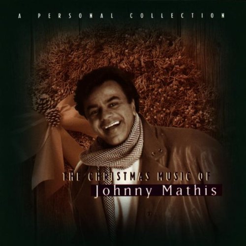 We Need A Little Christmas by Johnny Mathis